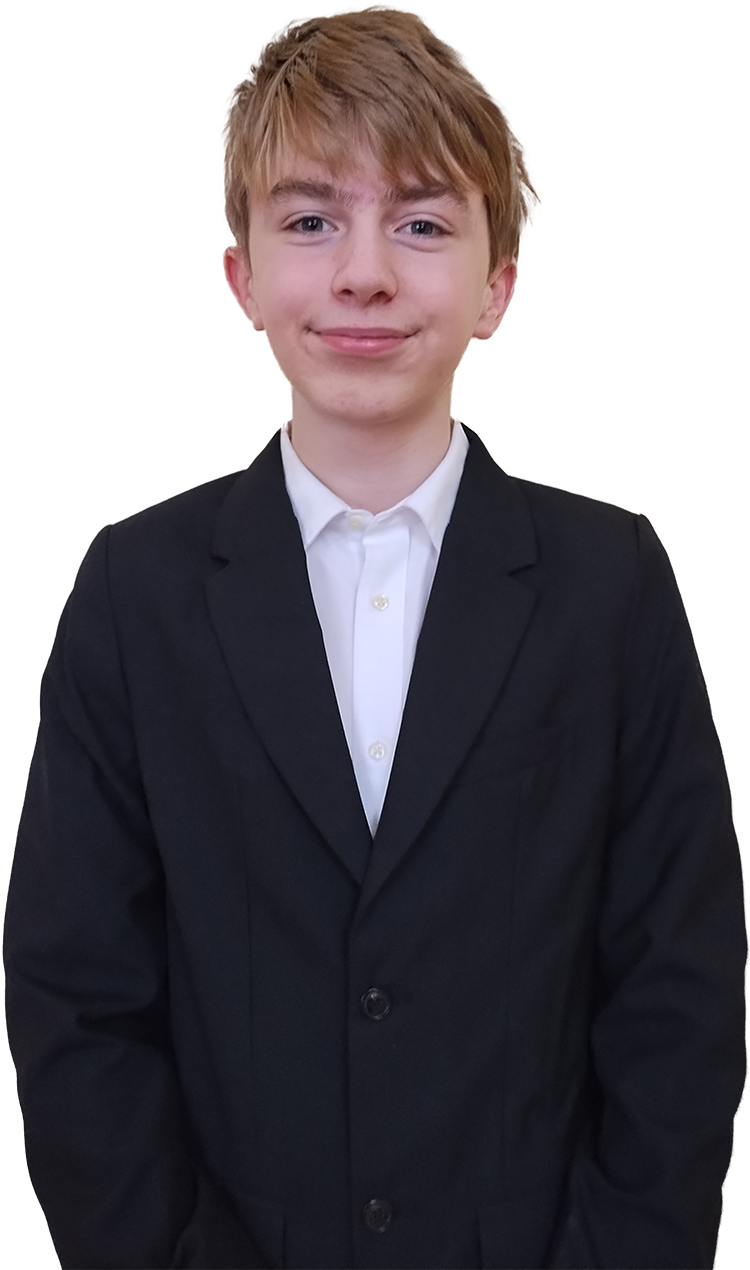 Ethan smiles pleasantly wearing a black suit and white shirt